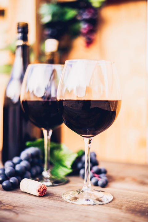 Red wine, grapes and wine bottles. Winetasting al fresco. Red wine, grapes and wine bottles. Winetasting al fresco.