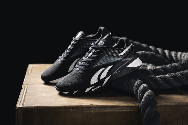 reebok nano x3 shoes on a wooden box with rope