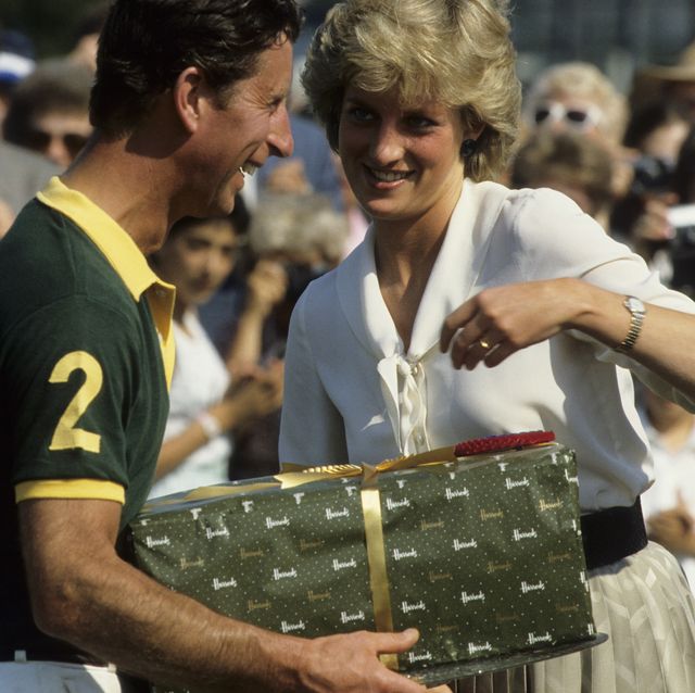 cirencester, united kingdom   july 11  charles, prince of wales receives a gift from his wife, princess diana, at the end of a polo match on july 11, 1987 in cirencester, england  photo by georges de keerlegetty images