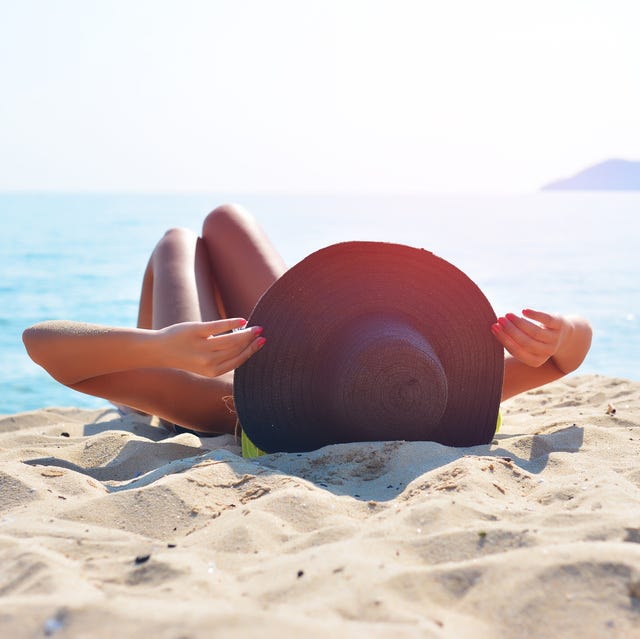 Relaxing and Sunbathing at Sun skin cancer signs