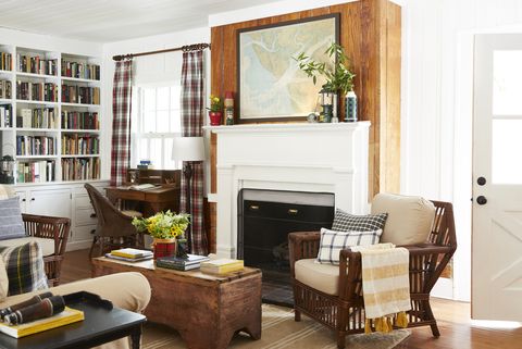 rattan chairs, primitive wood desk, fireplace, plaid curtains lakeside cabin, houston lake, georgia walter gray, kelly gray