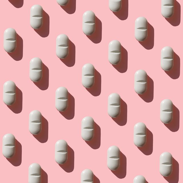 repeated pills on pink background