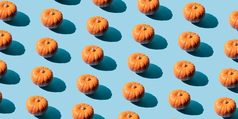 Repeated pumpkin on the blue background