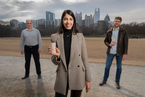 researchers at georgia tech hold up their rotman lens rectenna