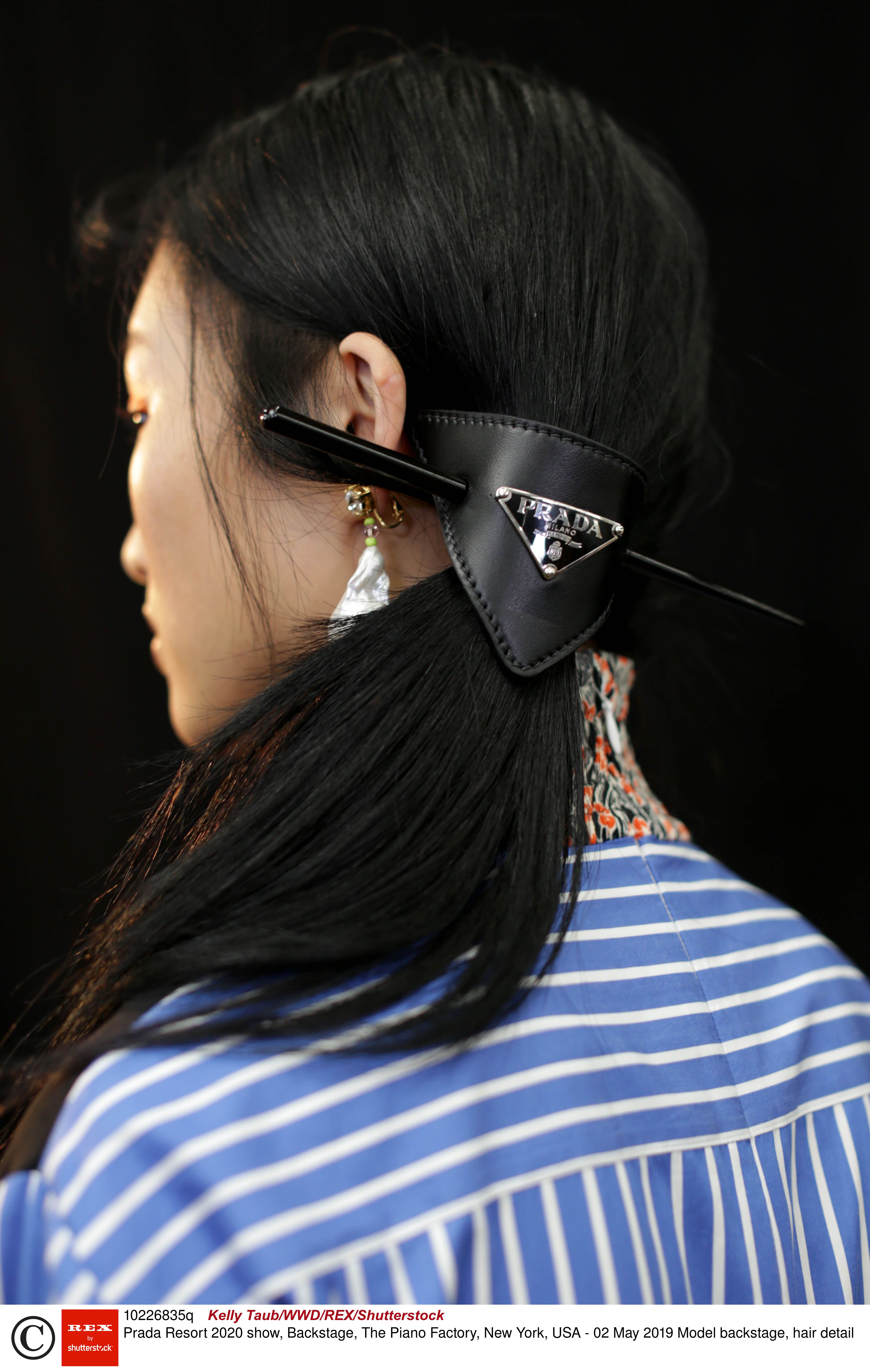 prada leather hair clip