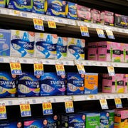 rfyygd feminine product section of a grocery store interior tampax, playtex, tampons