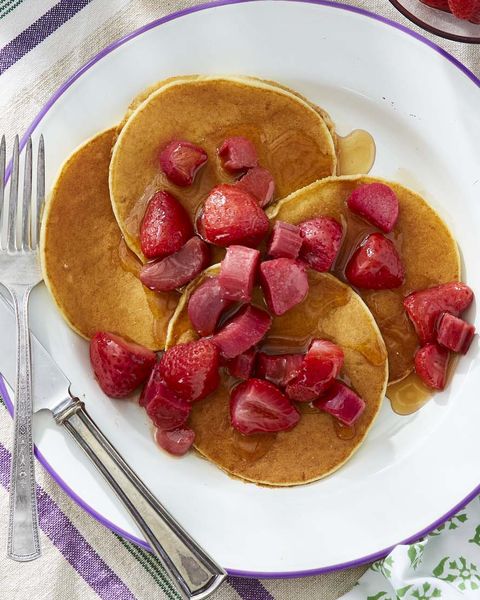 ricotta pancakes topped with strawberries and rhubarb