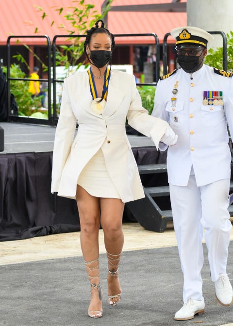 Rihanna during the National Honors ceremony in a white dress and blazer rihanna during the national honors ceremony in a white dress and blazer