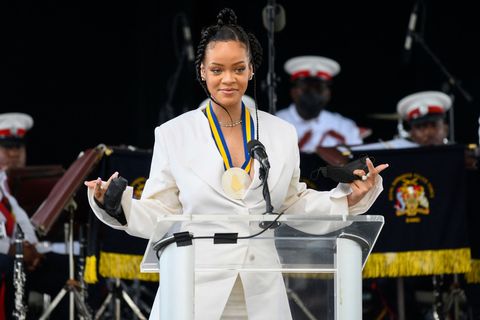 rihanna during the national honors ceremony in a white dress and blazer