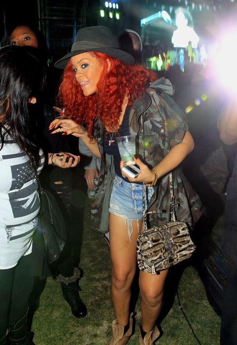 rihanna at coachella 2011 in a cami jacket and denim cutoffs