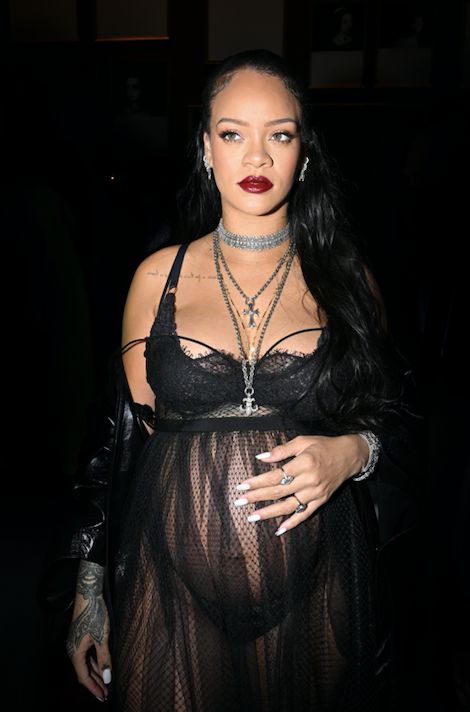 Rihanna shows off her baby bump in bubblegum blue cutout catsuit