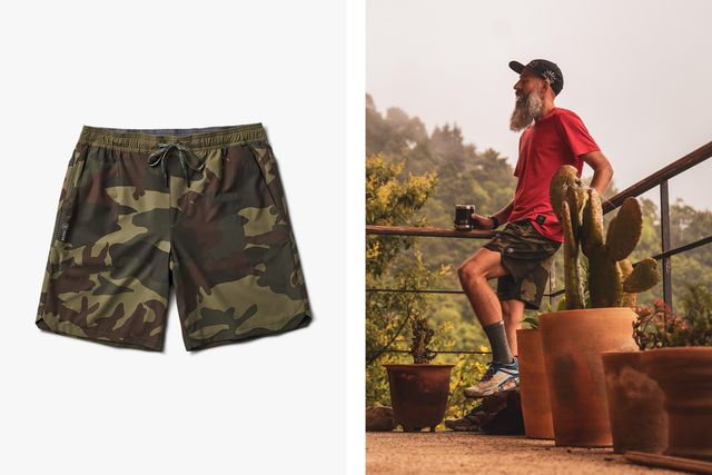 man leaning against railing next to cactus wearing roarks the serrano 2 shorts