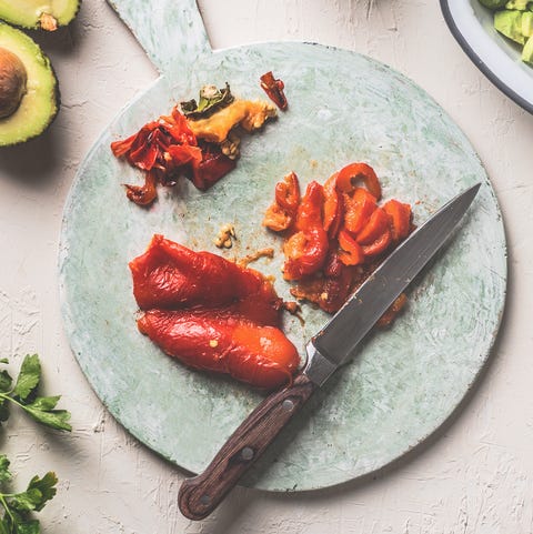 Roasted paprika on cutting board with knife roasted paprika on cutting board with knife