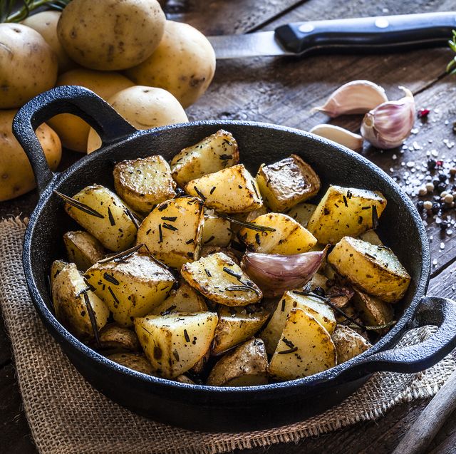 roasted potatoes on wooden kitchen table