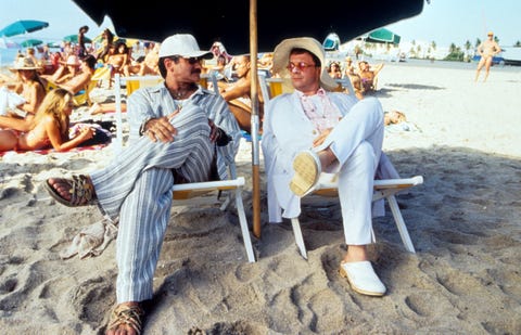 robin williams and nathan lane in a cage of crickets