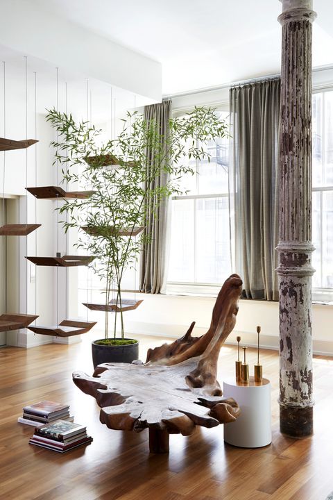rodney lawrence home tour, nyc foyer hanging shelves by zanini de zanine delicately distinguish the entryway and can actually hold books and accessories