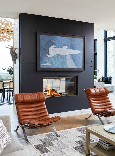 a frame chalet in collingwood, ontario designed by by sarah richardson design and murakami design living room chairs vintage art clients' own