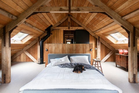 primary bedroom in berkshire, england home designed by london based architecture and interiors firm mclaren    bed amode  carpet gilt edge carpets  lights astro lighting