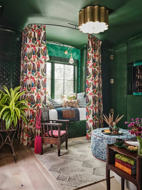 wife and husband duo heather and matt french, of santa fe's french  french interiors, splashed this media room in bold pattern, dramatic color, and tons of texture, then crowned the design with a curtained trundle bed and added closed door, trellis inspired cabinets    drapery and ottoman fabric iris apfel for fabricut   lighting circa lighting  rug the rug company   paint farrow  ball   art field studies editions   bulbs cync   wallcovering philllip jeffries