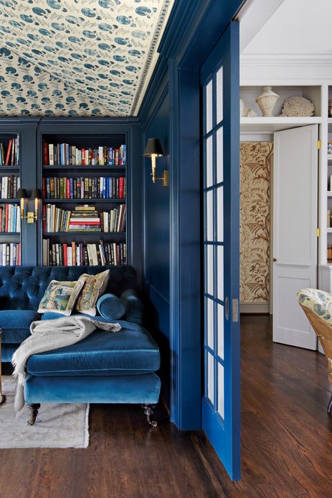 home library designed by jeannette whitson shelves painted ball hague blue
