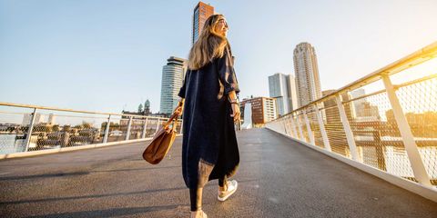 Woman walking in Rotterdam city