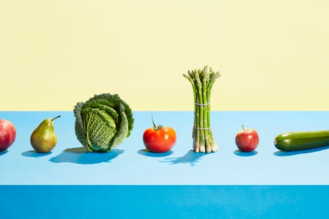 a row of different fruit and vegetables