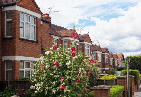 a row of contemporary suburban terraced houses in berkshire, near the british capital city, london