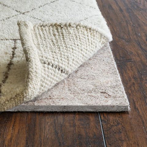 felted rug pad underneath a rug