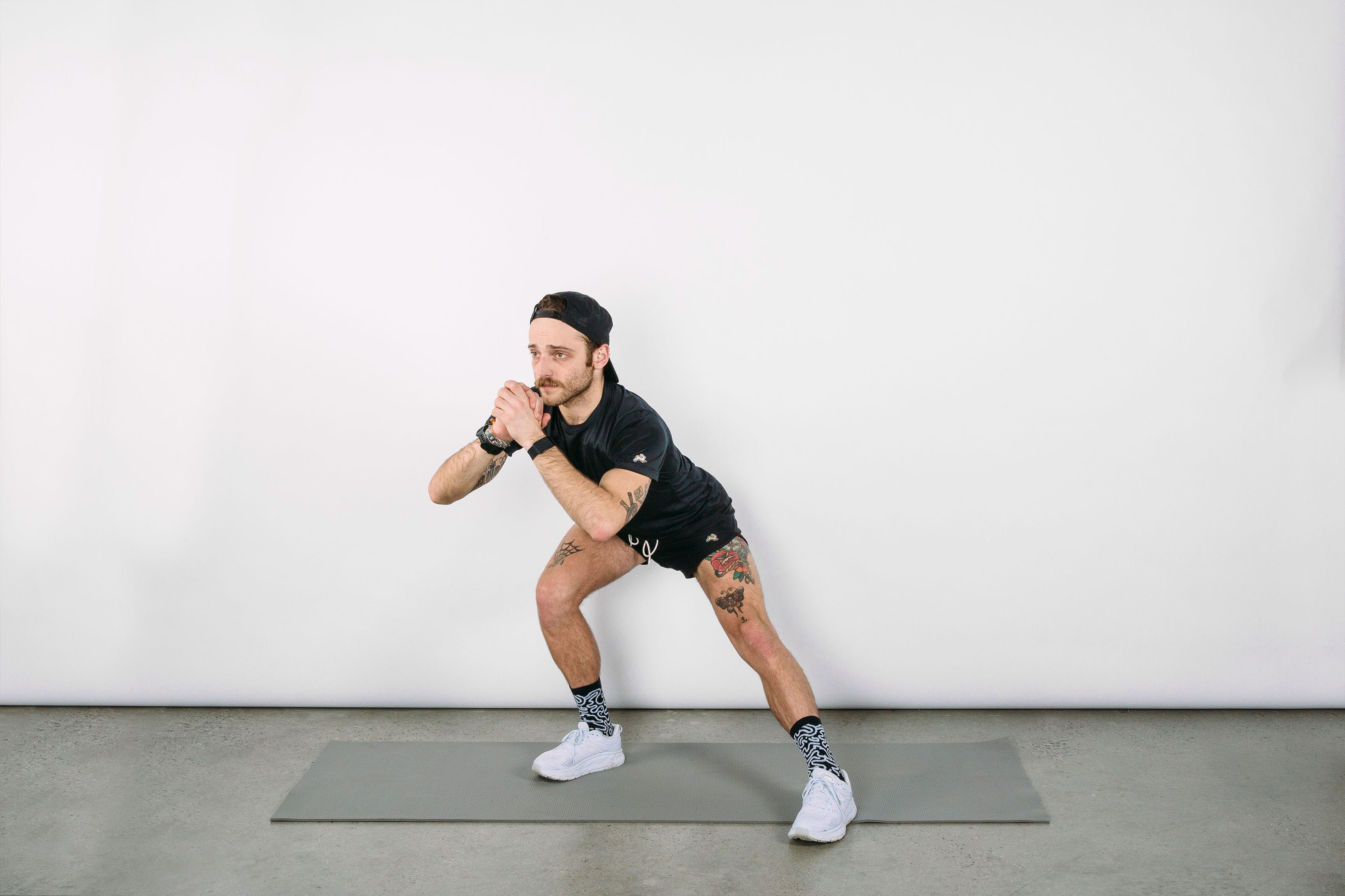 These 5 Standing Stretches Provide the Perfect Warmup Before Your Run