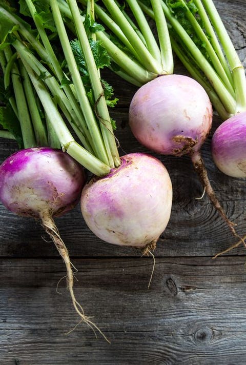 rusticorganic turnips on genuine wood background for vegetarian food