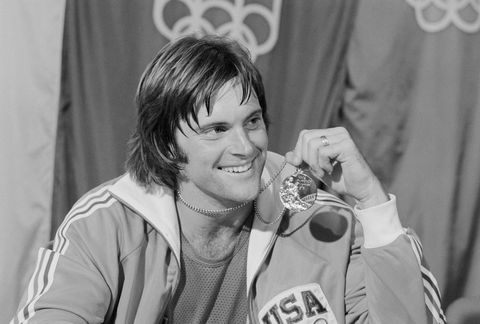 bruce jenner holding his gold medal