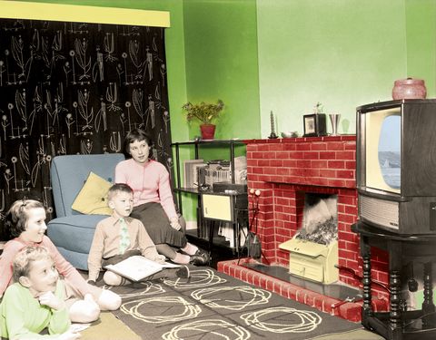 1950's style family watching television