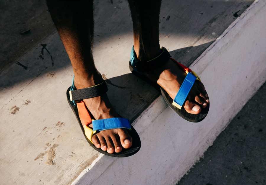fila disruptor sandals on feet