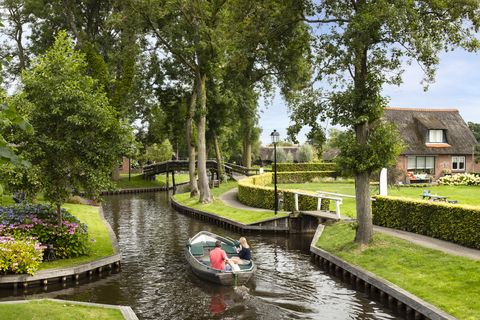 sailing through the small village of giethoorn