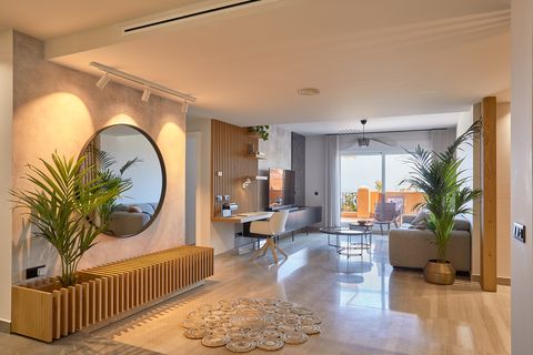 salón open concept decorado con madera y fibras naturales