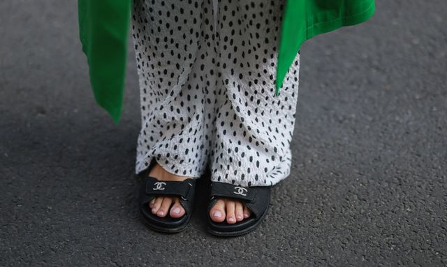 berlin, germany   may 03 sonia lyson seen wearing a beige with black polka dots wide leg pants from zara and black sandals from chanel on may 03, 2022 in berlin, germany photo by jeremy moellergetty images