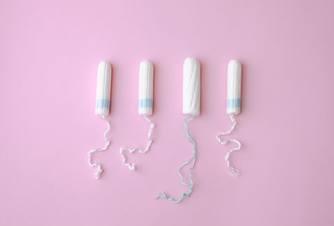 4 tampons against a pink background