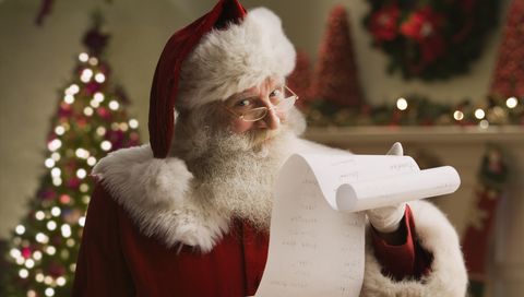 Santa Claus with checklist, portrait, close-up