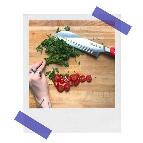 danielle chopping cilantro with a made in santoku knife