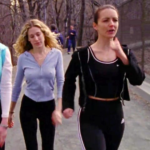 carrie bradshaw in leggings and a zip up hoodie