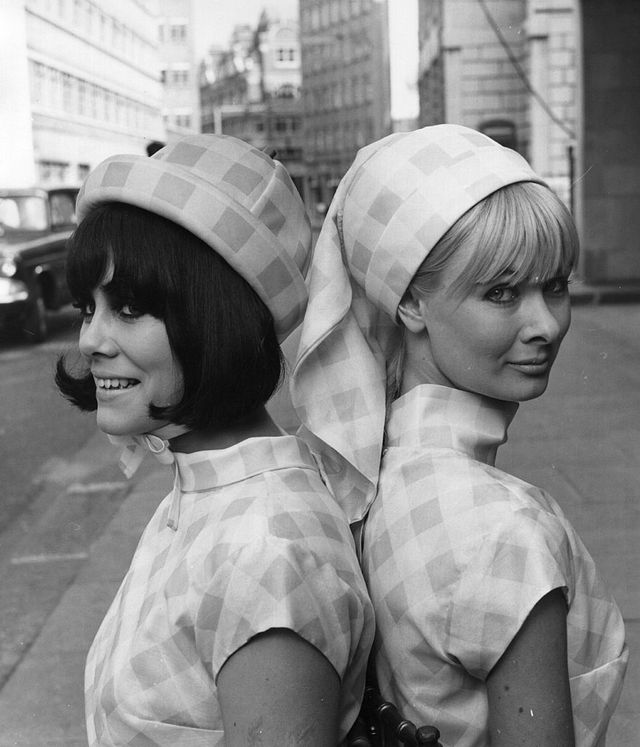april 1965  hats from a range of spring hats for the young, by the millinery guild, in savile row, london  model on the left wears a check lawn tropical space shaped roller with chin straps, and on the right she wears a mary poppins cap   as well as blouses to match  photo by fox photosgetty images