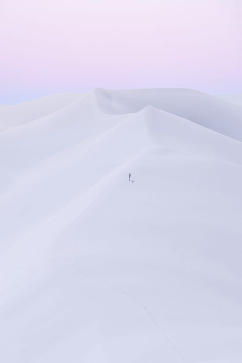 scenic view of white sands against sky