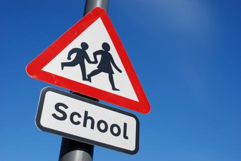 School children crossing sign with copy space