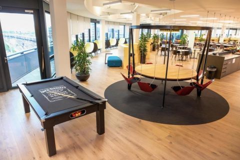 deliveroo office cool offices swing london tech insanely work feel employees sit desks chairs pool working play their when savvy