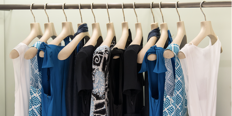 Clothes hanger, Blue, Clothing, Room, Dress, Boutique, Closet, Textile, Fashion design, Wardrobe, 