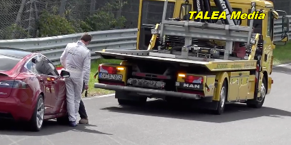 Watch 4 Porsches Lap a Tesla Model S Broken Down on the Nürburgring