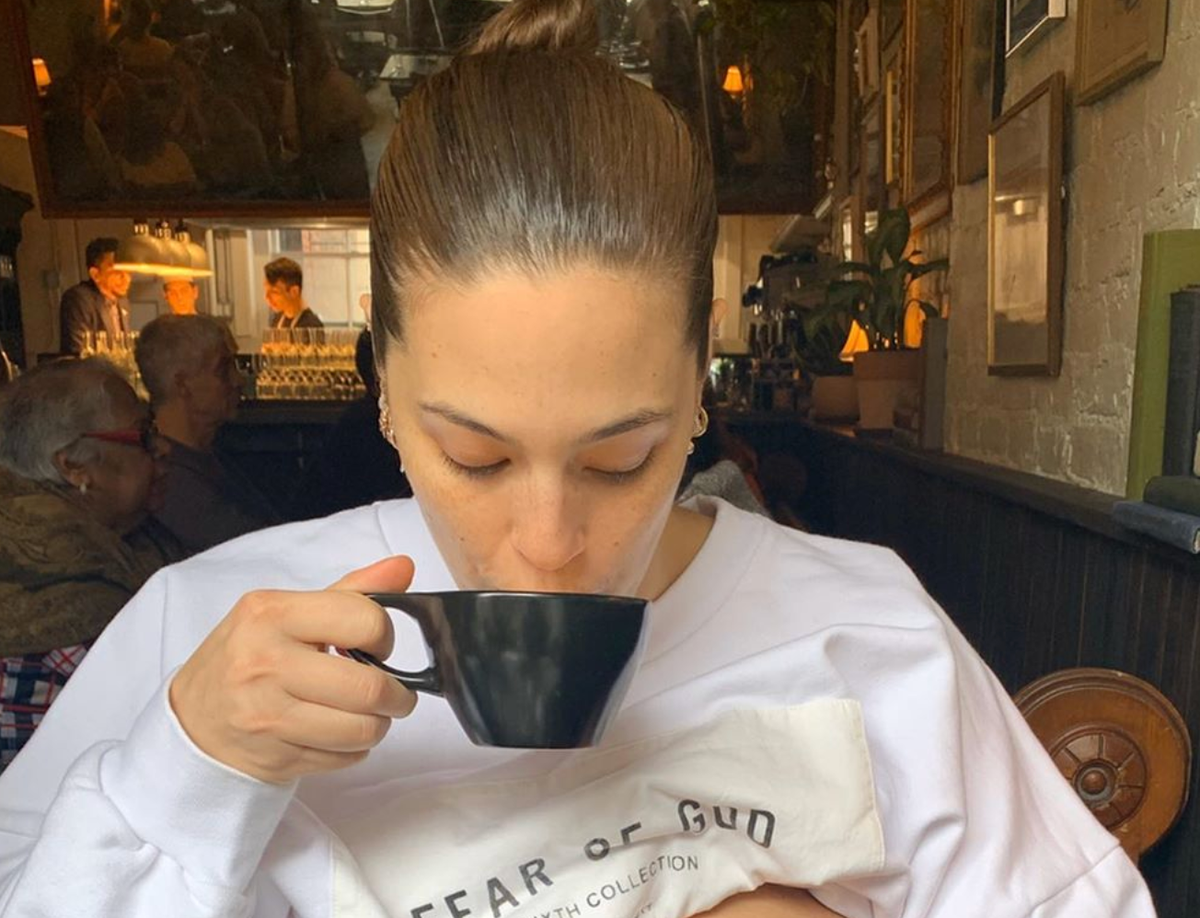 Ashley Graham Shares A Candid Shot Of Breastfeeding While She Has Coffee