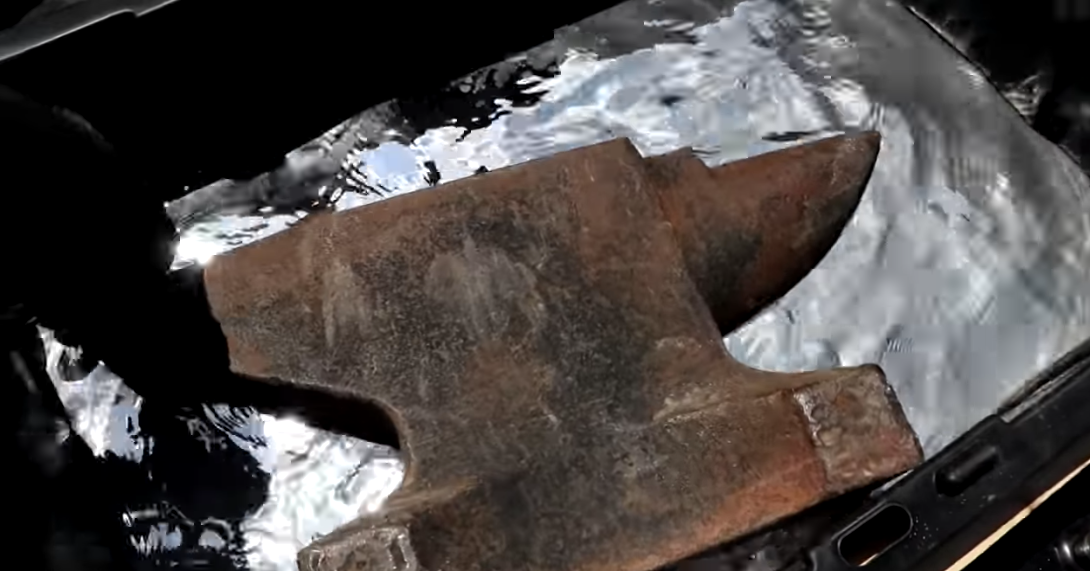 Watch What Happens When You Drop an Iron Anvil in a Vat of Liquid Mercury