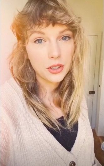 Taylor Swift has a curly fringe and we can't stop staring