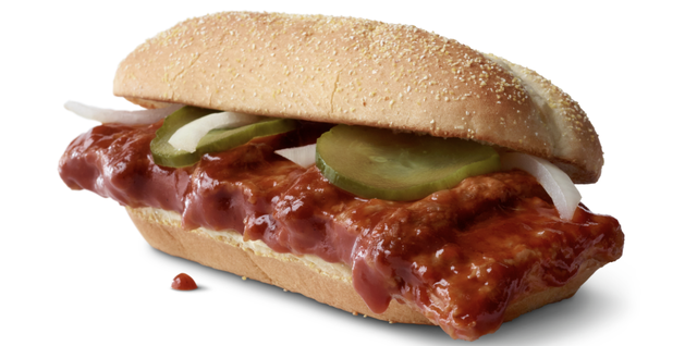 mcdonald's mcrib sandwich, barbecue pork with slivered onions and tart pickles on a bun